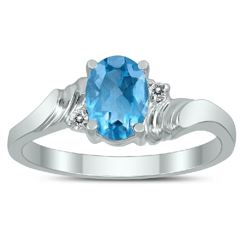 7X5MM Blue Topaz and Diamond Wave Ring in 10K White Gold