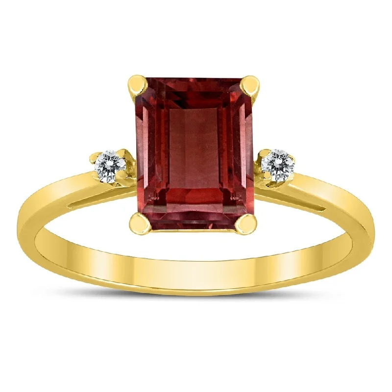 Emerald Cut 8X6MM Garnet and Diamond Three Stone Ring in 10K Yellow Gold