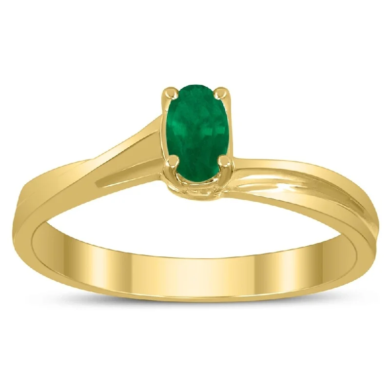 Solitaire Oval 5X3MM Emerald Gemstone Twist Ring in 10K Yellow Gold